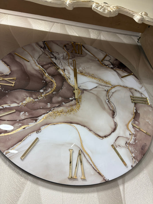 Orologio beige e oro